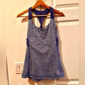 Lululemon Spin Me Tank 
Heathered royal blue Circle Mesh  Twisted racerback Sz 4